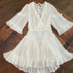 MACARON: Brand new white dress w ruffles & an open on the lower back, SMALL